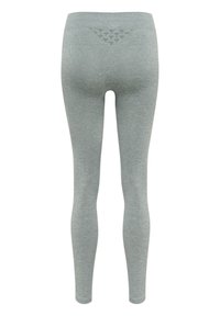 Grå tights med hög midja, med ett strukturerat triangelmönster på baksidan och en slät, åtsittande design.