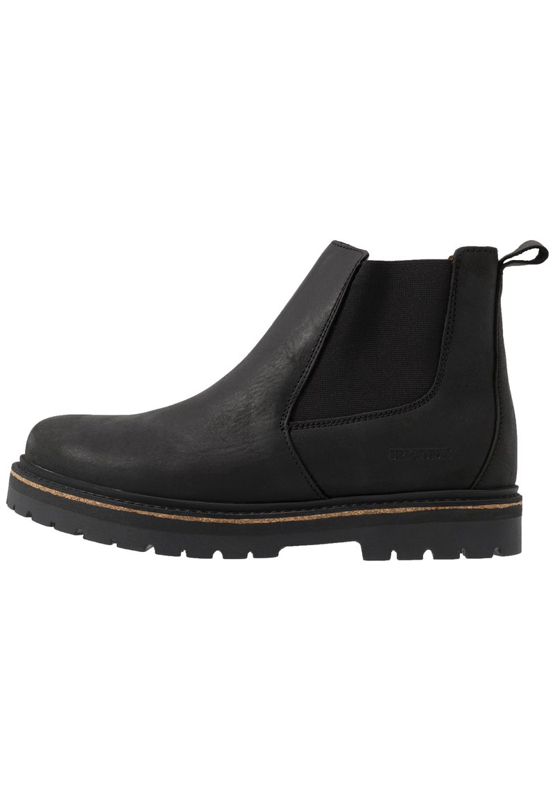 Bottines Chelsea noires en cuir lisse avec des panneaux latéraux élastiques, une semelle en caoutchouc robuste et une languette à l'arrière pour un enfilage facile.