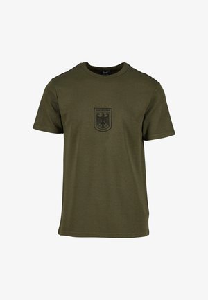Camiseta de algodón verde oliva con mangas cortas, que presenta un emblema negro del águila de la Bundeswehr en el pecho y un cuello redondo.