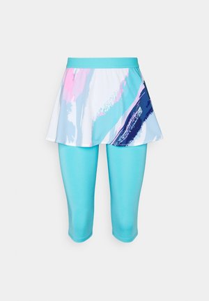 Leggings bleu clair trois-quarts avec jupe courte attachée présentant des motifs abstraits en rose pastel, blanc et bleu marine.