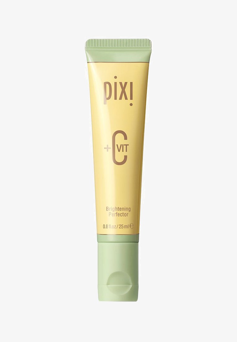 Gul tube med grønn kappe, med brun tekst og et sirkulært designelement, merket "pixi + C VIT Brightening Perfector," 25 ml.