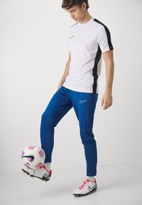 Nike Performance DRI-FIT ACADEMY PANT - Donji dijelovi trenirke - court blue/aquarius blue