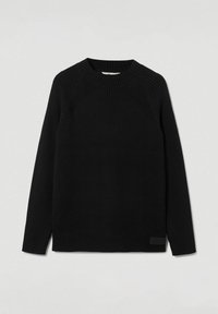 Czarny sweter z prążkowanego dzianiny, z okrągłym dekoltem, długimi rękawami i bocznym akcentem na brzegu z delikatną metką. Miękka tekstura i dopasowany krój.