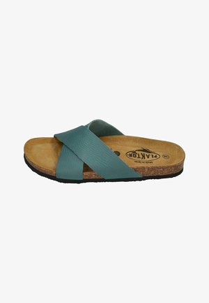 Teal leather slide sandal with cross straps, cork footbed, and textured rubber outsole. Simple design, with beige interior and brand logo.