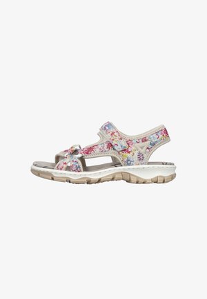 Sandale sportive pour femme à bout ouvert avec des brides florales multicolores, des fermetures ajustables et une semelle épaisse beige texturée pour une utilisation en extérieur.