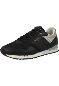 Baskets Pepe Jeans noires et beiges avec côtés texturés, lacets noirs, semelle blanche et détails de marque sur le côté et la languette.