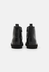 Calvin Klein Jeans EVA BOOT MID LACEUP - Nööritavad poolsaapad - triple black
