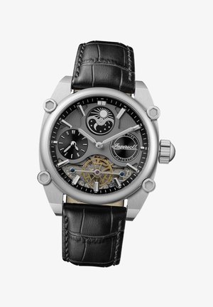 Herren Automatikuhr mit silbernem Edelstahlgehäuse, schwarzem Zifferblatt, Lederarmband und sichtbaren filigranen Bewegungselementen.