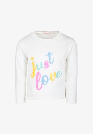 Chemise blanche à manches longues avec un texte coloré et texturé qui indique "just love" en rose, bleu, jaune et vert. Tissu en coton doux.