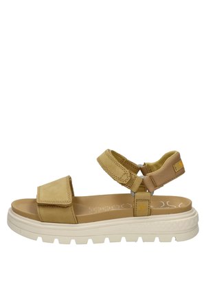 Infradito beige con cinturini in velcro regolabili, suola ammortizzata e una suola bianca spessa con motivi di presa texturizzati.