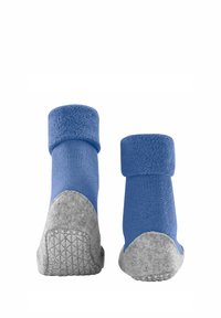 Niebieskie, dziane skarpetki z szarymi filcowymi podeszwami i mankietami. Posiadają fakturowany gumowy uchwyt na spodzie dla zwiększenia przyczepności.