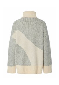 Hallid villane sviiter halli ja kreemika värviga. Omab kõrget krae, sooniktekstuuri ja abstraktset mustrit seljaosas. Laisk istuvus.