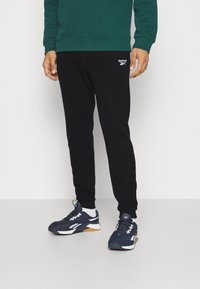 Reebok - IDENTITY SMALL LOGO FRENCH TERRY JOGGER TRACKSUIT BOTTOMS - Tracksuit bottoms - black Thumbnail Image 1