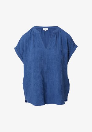 Haut court à manches courtes texturé en bleu avec un col en V et des manches légèrement roulées, présentant un ourlet irrégulier et des détails de couture visibles.