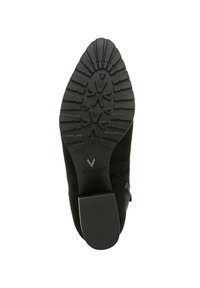 Stivale in suede nero con una suola in gomma testurizzata caratterizzata da un motivo antiscivolo e un tacco liscio. Marchio Vionic visibile sulla suola.