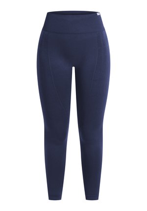 Donkerblauwe leggings met een hoge taille, een zachte textuur en subtiele details langs de naden. Rekbaar materiaal voor een comfortabele pasvorm.
