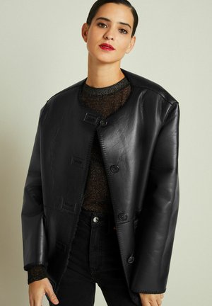 REVERSIBLE - Keinonahkatakki - black