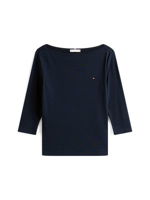 Navy blue long-sleeve top with a boat neckline and a small embroidered logo on the chest. Made from soft, flexible fabric.