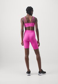 Girlfriend Collective COMPRESSIVE HIGH RISE BIKE SHORTS - Legíny - ultraviolet