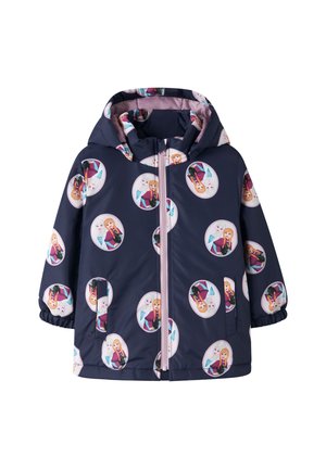 Veste à capuche enfant bleu marine avec fermeture éclair rose, décorée de motifs circulaires répétitifs représentant deux personnages féminins animés.
