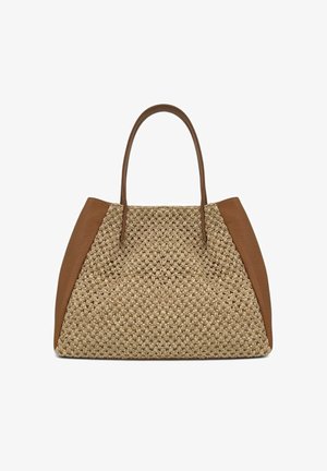 Sac à main avec centre en tissu beige tissé et côtés et poignées en cuir marron lisse, forme trapézoïdale, sur fond blanc.