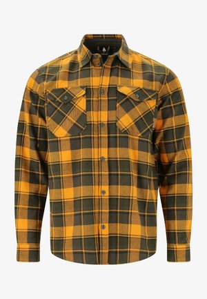 Flanellipaita, jossa on keltainen ja vihreä ruudullinen kuvio, pitkät hihat, napitettava etuosa ja kaksi rintataskua, joissa on terävät läpät.