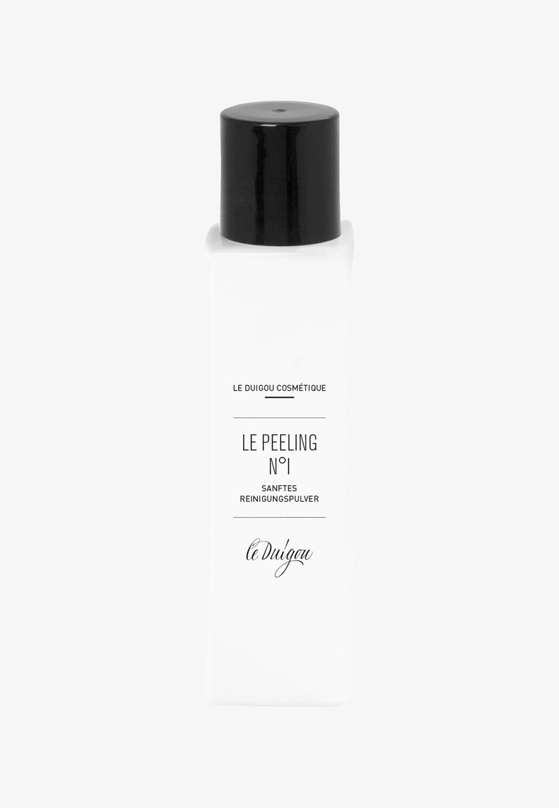 Bouteille cosmétique rectangulaire blanche avec un capuchon noir portant l'étiquette "Le Peeling No 1 Sanftes Reinigungspulver" par Le Duigou.