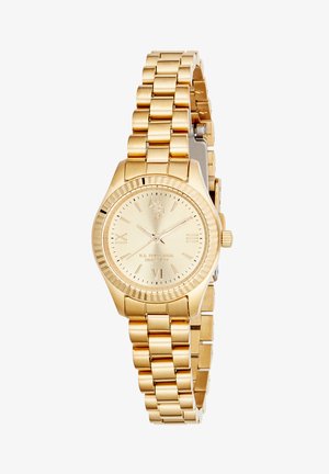 Montre-bracelet en métal ton or avec bracelet à maillons, cadran rond avec chiffres romains et logo à 12 heures, affichage analogique à trois aiguilles.