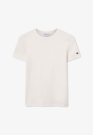 Biała, prążkowana koszulka Champion z krótkim rękawem, okrągłym dekoltem i małym logo na lewym rękawie.