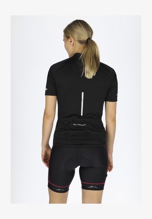 Czarna koszulka rowerowa z krótkimi rękawami, z tylną kieszenią i odblaskowym paskiem. Czarne spodenki z różowymi akcentami i z wypełnieniem.