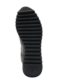 Black boot sole with ridged pattern, featuring pronounced treads for traction. Made of textured rubber, showing horizontal grooves and a rounded toe.