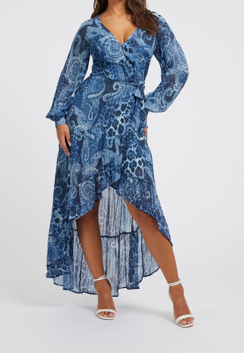 Robe bleu à manches longues croisée ornée d'un motif paisley et léopard. Ourlet à volants en dégradé avec une taille ceinturée.