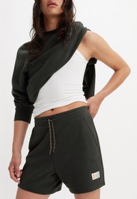 Levi's® PRIDE GRAPHIC UNISEX - Trainingsbroek - pirate black