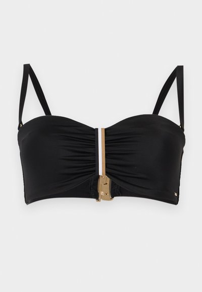 Haut de bikini bandeau noir avec fines bretelles ajustables, une fermeture frontale dorée et une bande verticale centrale marron, blanche et noire.