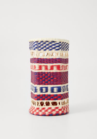 Woven storage basket featuring alternating red, blue, and natural materials. Circular base, cylindrical shape, with decorative patterns.