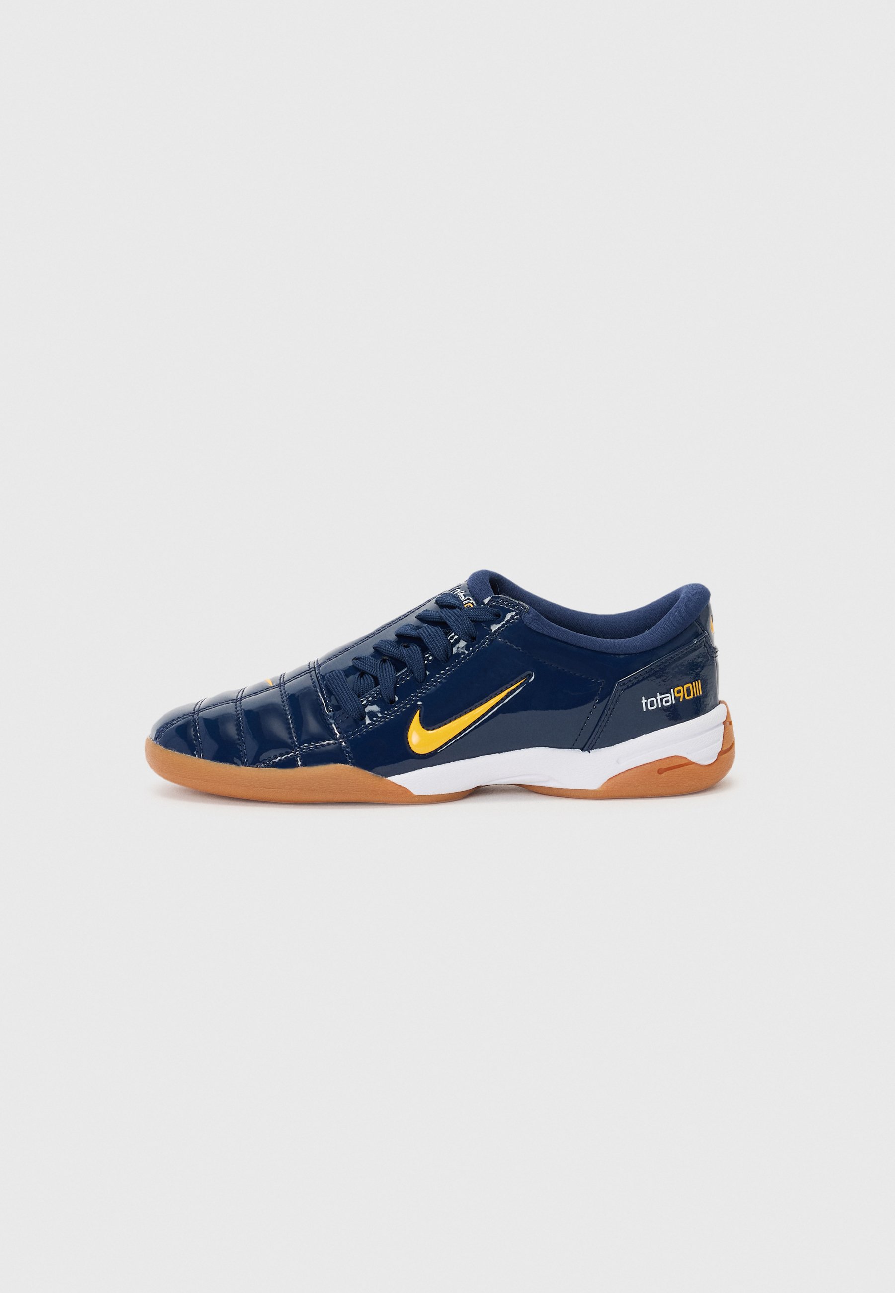 nike navy and gold shoes