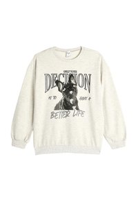 Lichtgrijze crewneck sweatshirt van zacht materiaal. Heeft een afbeelding van een Franse bulldog met de tekst "ENKELE JOUW BESLISSING IS OM EEN BETERE LEVEN TE HEBBEN."