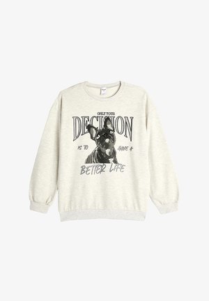 Lys grå crewneck sweatshirt lavet af blødt stof. Har et grafisk motiv af en fransk bulldog med teksten "DEN ENESTE BESLUTNING DU HAR, ER AT FÅ ET BEDRE LIV."