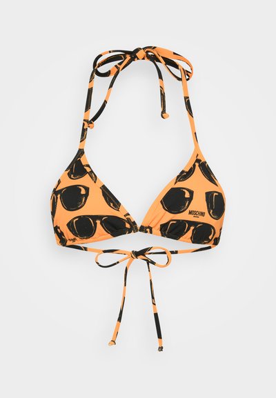 Orange bikini top with black sunglass pattern, triangular cups, adjustable ties at neck and back, smooth texture, branded with Moschino logo.