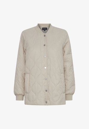 Gestepptes beiges Jacket mit rundem Kragen, Druckknöpfen, Seitentaschen und elastischen Bündchen. Weiche Textur mit subtilen Wellenmuster.