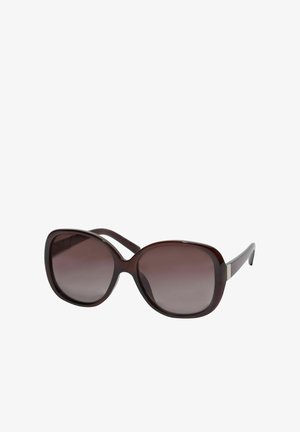 Brown oversized sunglasses with a glossy finish. Gradual tint from dark brown to lighter shades. Straight temples with subtle metallic accents.