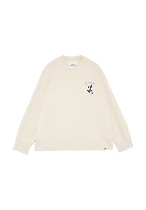 Sweat-shirt col rond couleur crème à manches longues, petit motif abstrait bleu foncé et texte "OTTOD'Ame" sur le haut gauche de la poitrine.