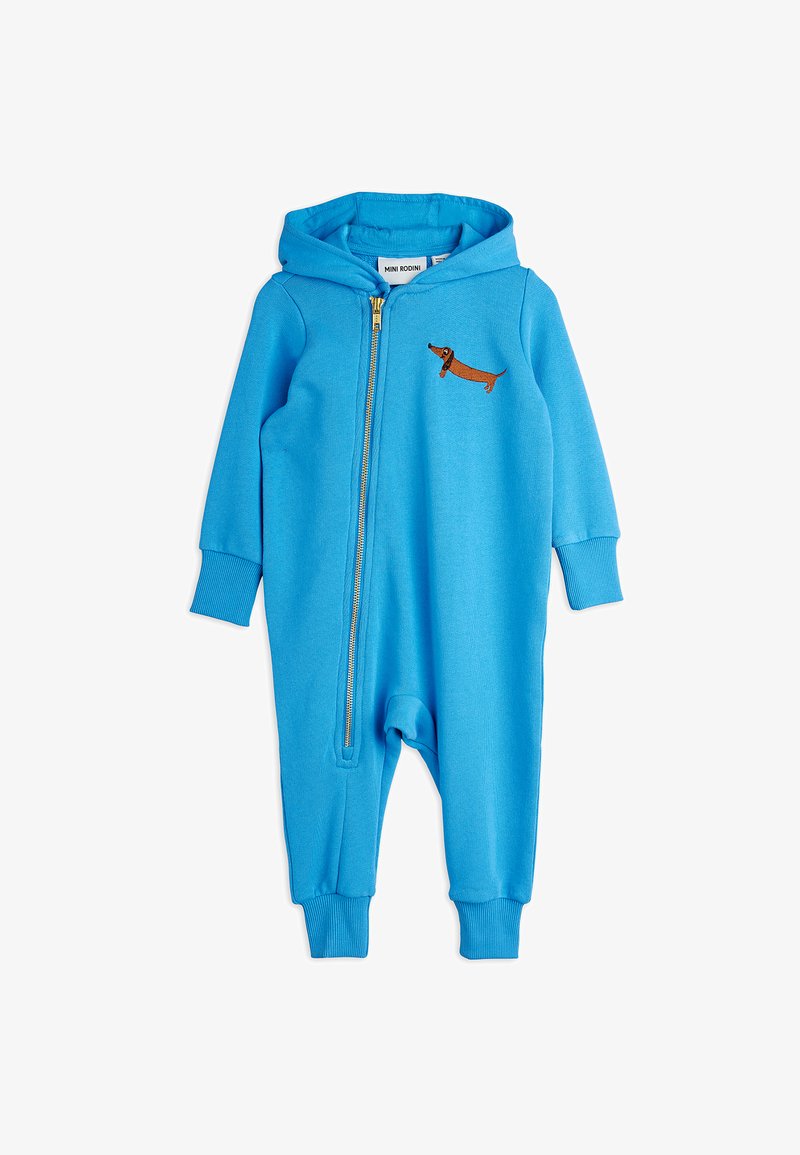Modra bombažna zip-up enodelnica s kapuco, ki na prsih prikazuje vezenje rjavega dachshunda, z rebrastimi manšetami na rokavih in gležnjih.