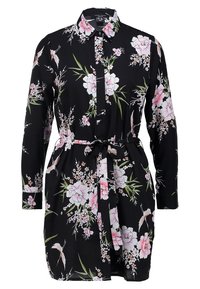 Svart långärmad skjortklänning med rosa och vita blommönster, knapp front, krage och ett matchande bälte i samma tyg vid midjan.