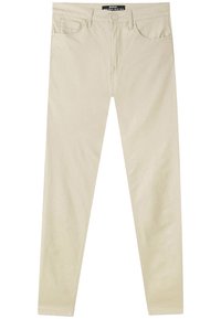 Beige slim-fit farkut, joissa on viisi taskua, vyölenksut sekä edessä nappi- ja vetskariw closure.