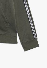 Nike Sportswear HOODIE TAPED - Träningsjacka - medium olive/white