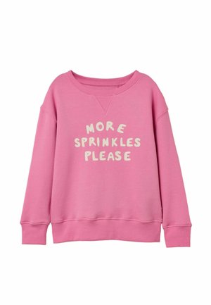 Pink crewneck sweatshirt with ribbed cuffs and hem, featuring white text saying "MORE SPRINKLES PLEASE" on the front.