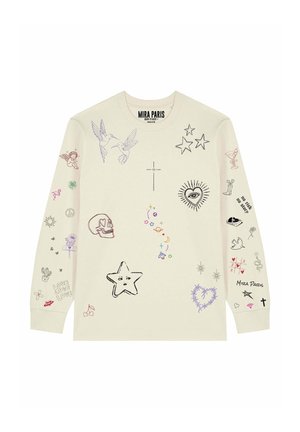 Maglietta beige a maniche lunghe con vari scarabocchi colorati tra cui stelle, un teschio, un occhio in un cuore, croci, uccelli e la scritta "Mira Paris".