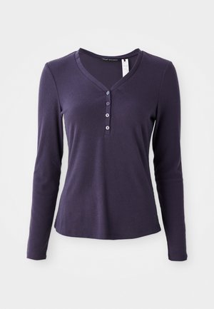 Long-sleeve, purple ribbed top with a V-neck and four-button placket. Soft texture, casual design, moderate fit, suitable for layering.