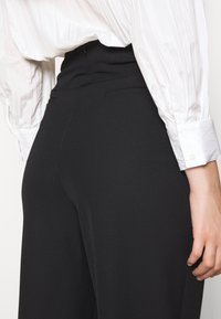 sandro Pantalon classique - black
